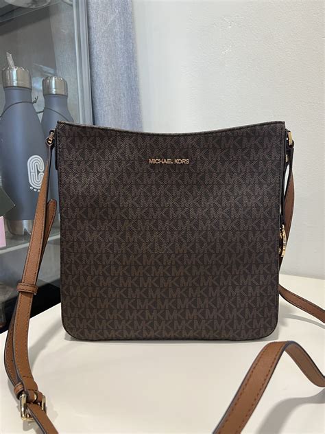 michael michael kors jet set travel large messenger crossbody bag|Michael Kors bag with airplanes.